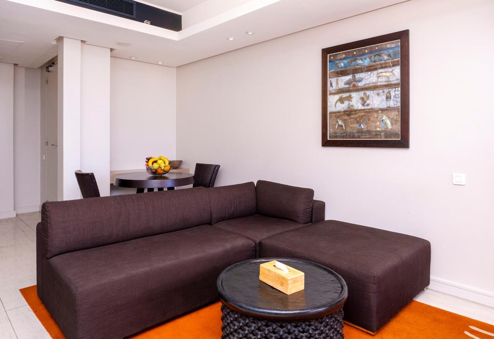 Radisson Blu Hotel, Dakar Sea Plaza Exterior foto A living room in a suite at the Hilton Tel Aviv